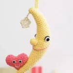 Crocheted moon and heart together